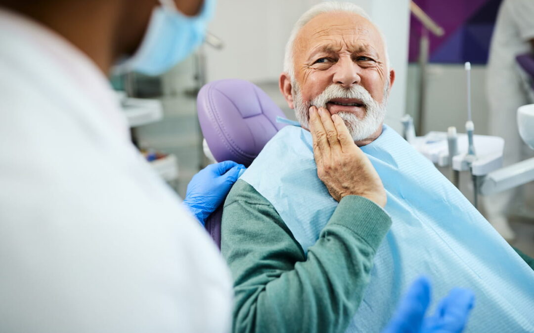 Dolore all’impianto dentale: i sintomi del rigetto